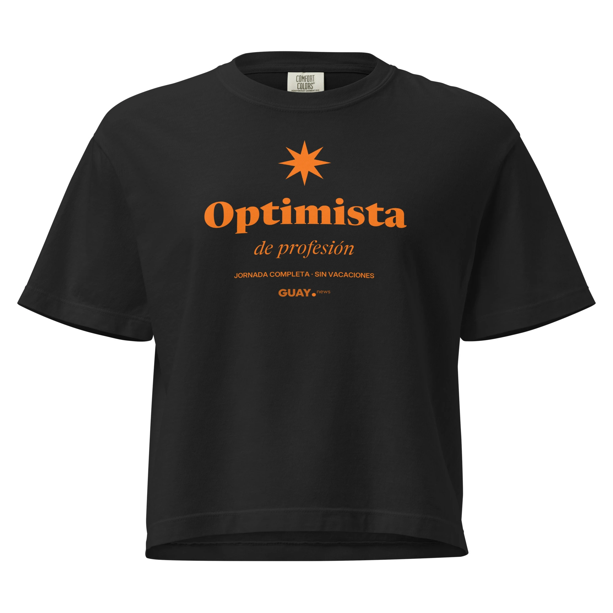 Camiseta boxy de mujer «Optimista de profesión» de GUAY.news en negro