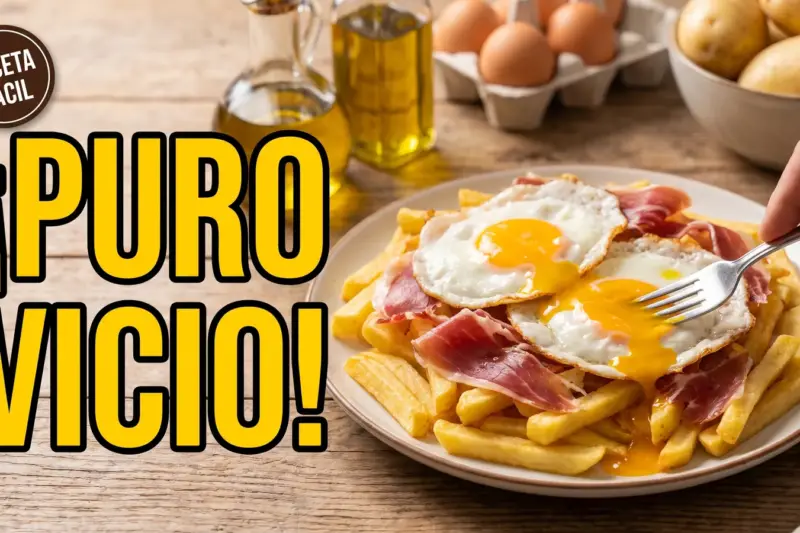 Huevos rotos con jamón ibérico y patatas fritas